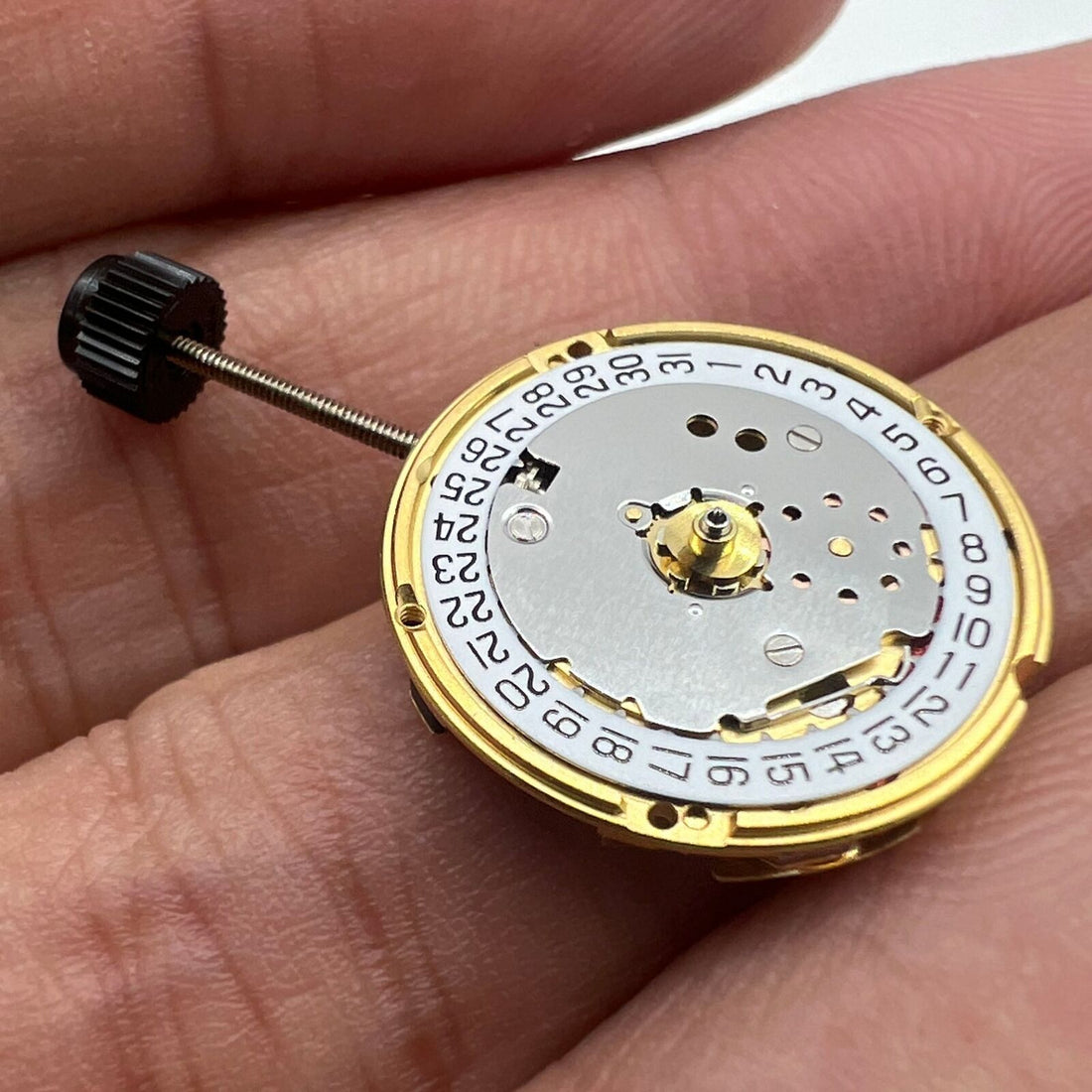 ETA F03.111 quartz watch movement with 3 hands, date at 3 o'clock, Swiss made for precision.