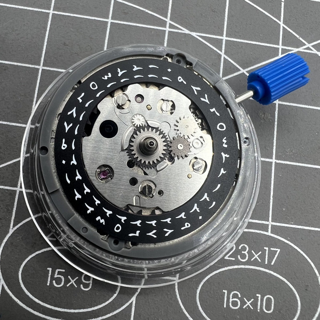 Automatic NH34 GMT watch movement with black dial, Arabic numerals, and seconds stop function by [Brand Name].