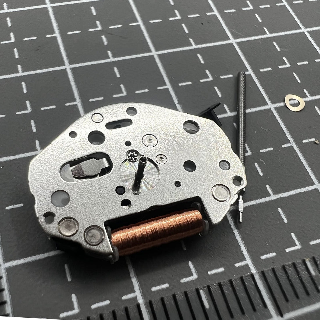 1. Miyota 2033 quartz movement with high pinion and three hands, ideal for watch repairs.  