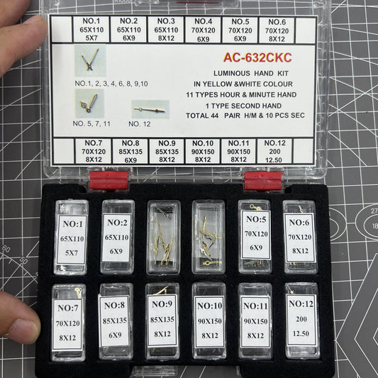 Golden and white luminous watch hands set for hour, minute, and second ? 44 sets for precise timekeeping.