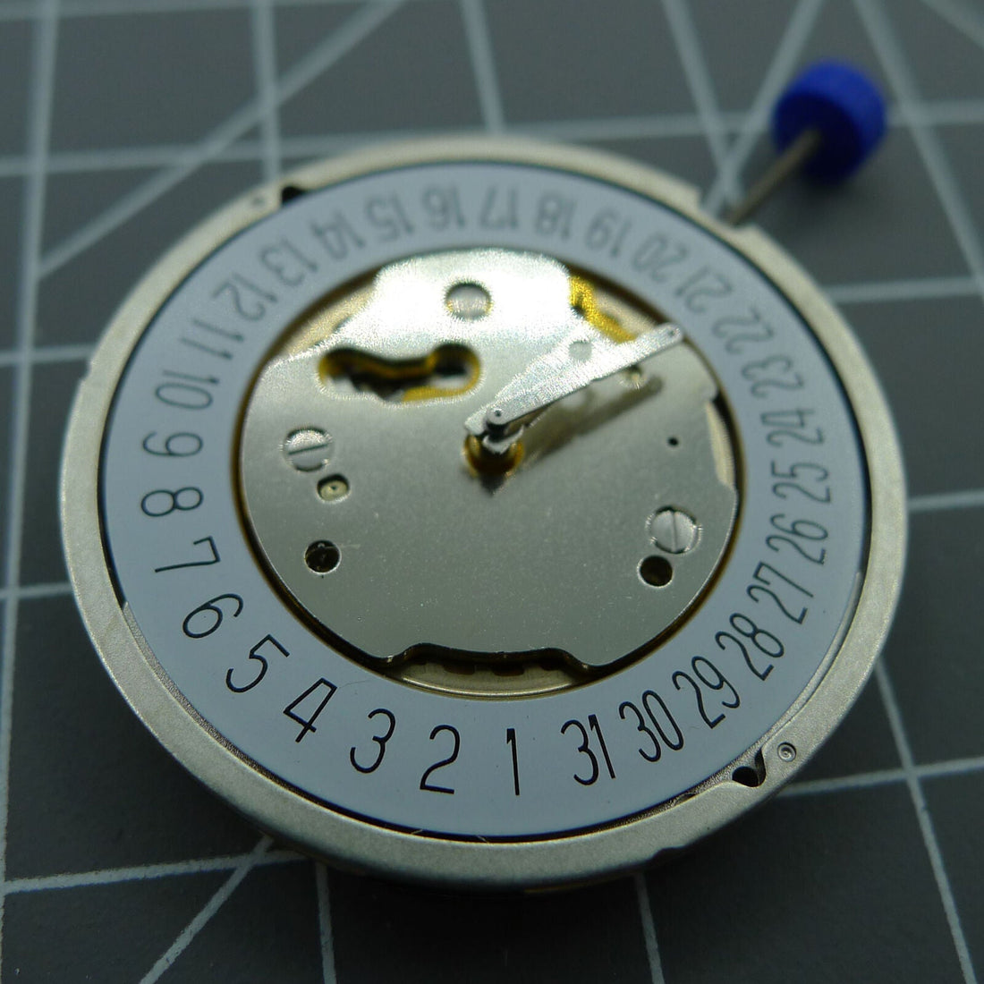 Ronda 5021D Swiss quartz watch movement with date at 6 for precise timekeeping and durability.