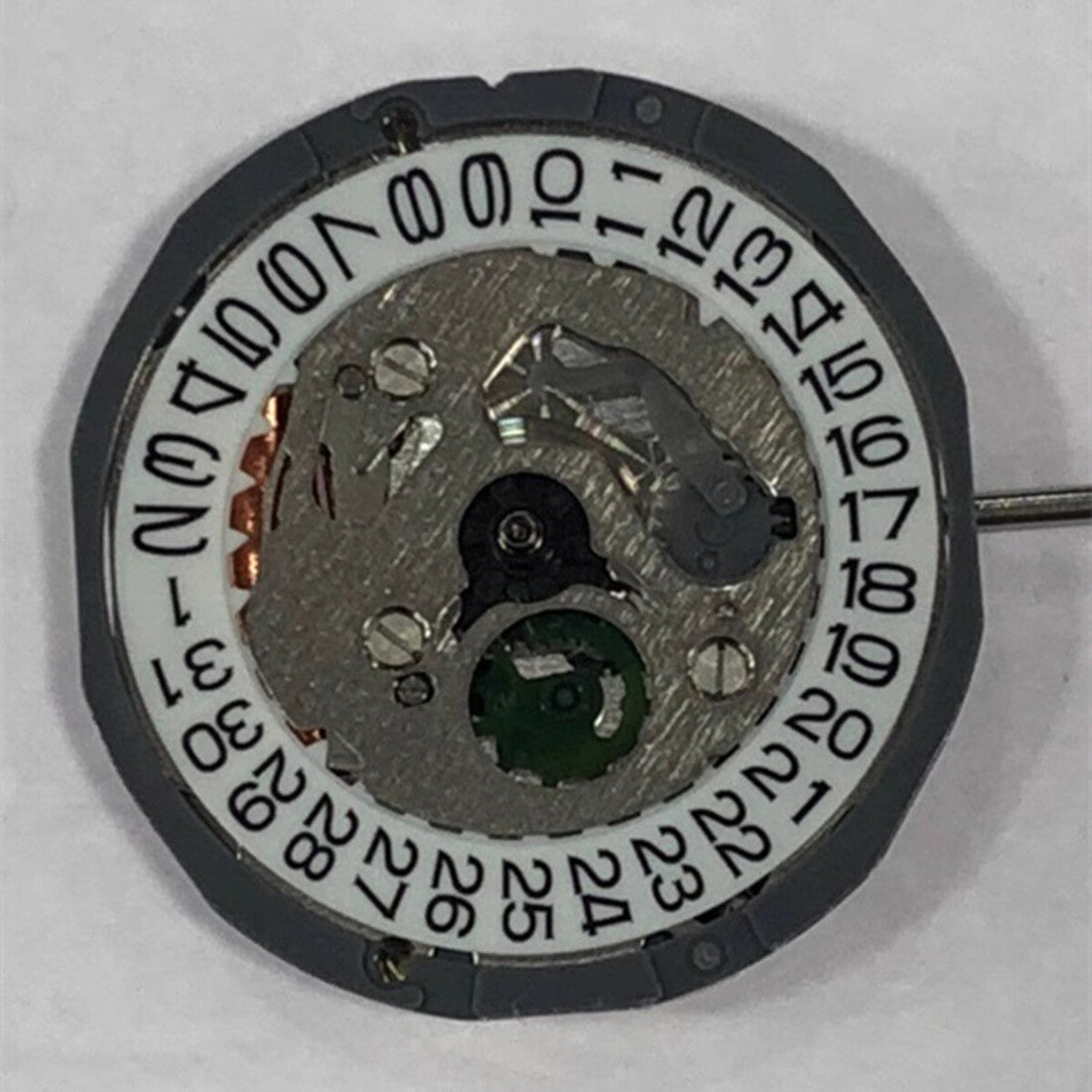 Miyota 1L12 quartz watch movement set with date display at 3 o'clock, Japan made.
