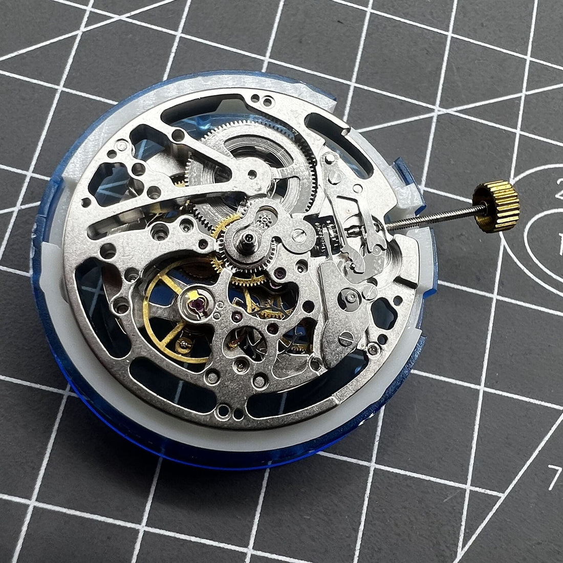 Dandong Silver watch accessory showcasing hollow automatic mechanical movement with second stop feature.