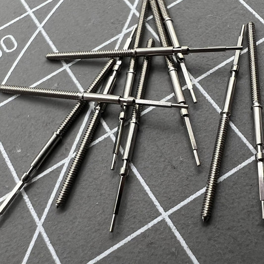 Swiss watch winding stem for Ronda 7004 movement, precision-made by Made brand for reliable time adjustment.