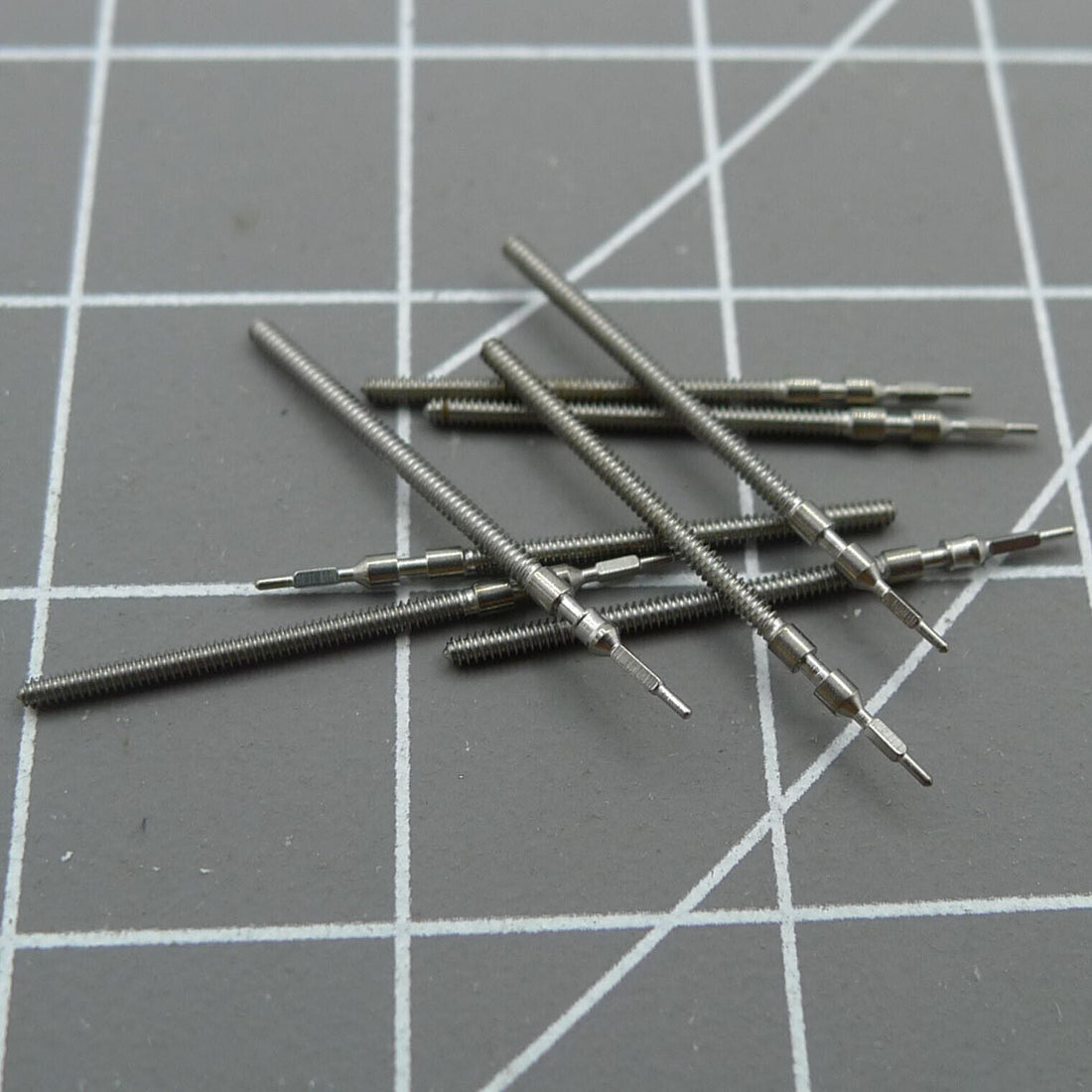 Set of 5 watch winding stems for Miyota 2035, 2025, 2033, 2036, and 2039 movements, precise fit.