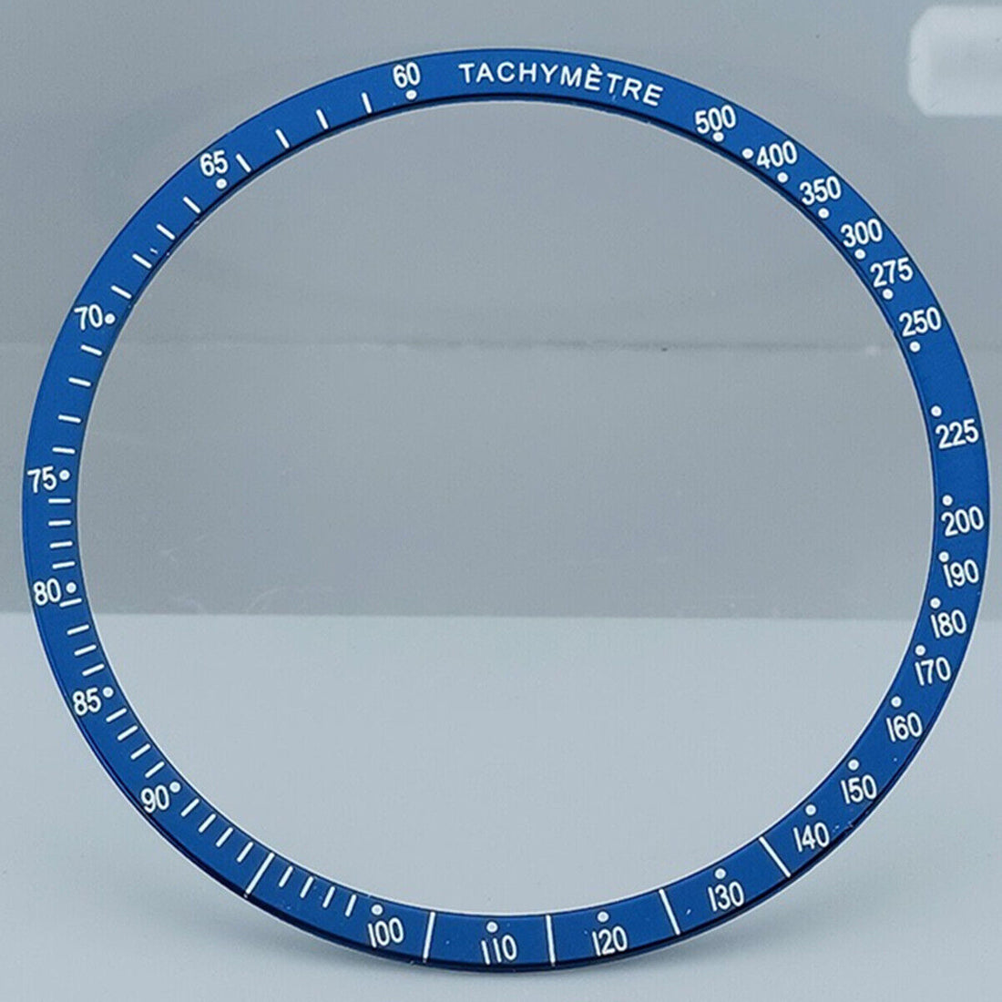 Blue 38.5mm aluminum alloy bezel with white font for Omega Speedmaster watches, durable and stylish accessory.