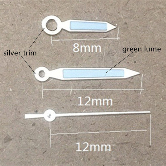 Silver trim green lume arrow watch hands for Miyota 1M12 movement, precise timekeeping accessory.