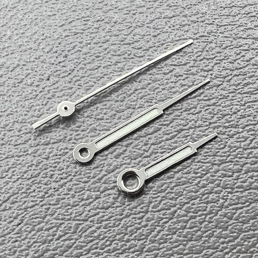 Set of 2 green luminous watch hands with silver accents for Ronda 515 movement by Zeigerset.
