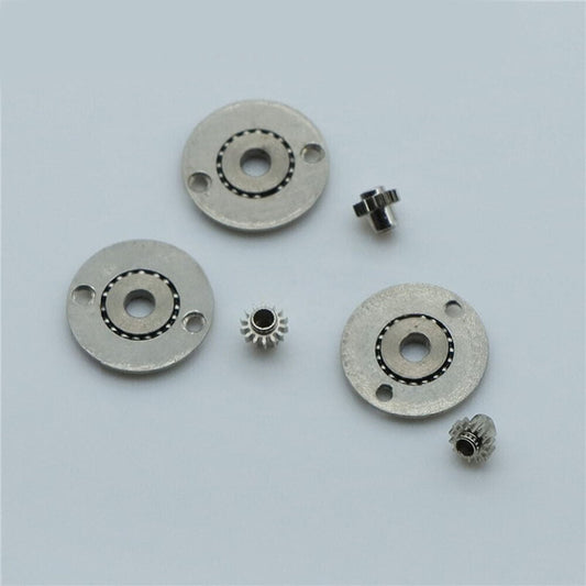 Set of 3 generic 7120 movement automatic ball bearings for watch repair and maintenance.