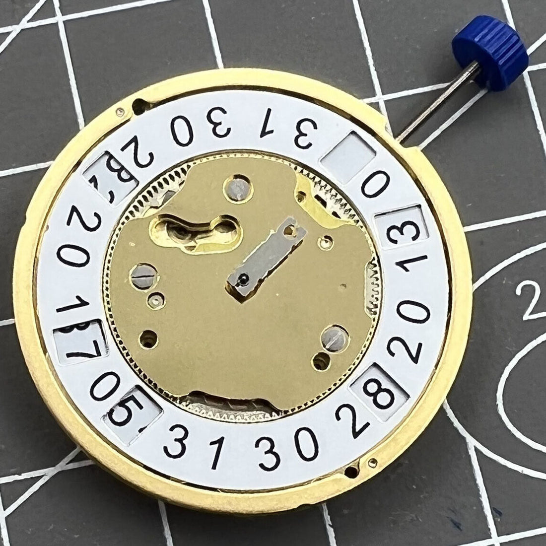 Ronda 4003B Quartz watch movement with date at 6, Swiss made for precise timekeeping.