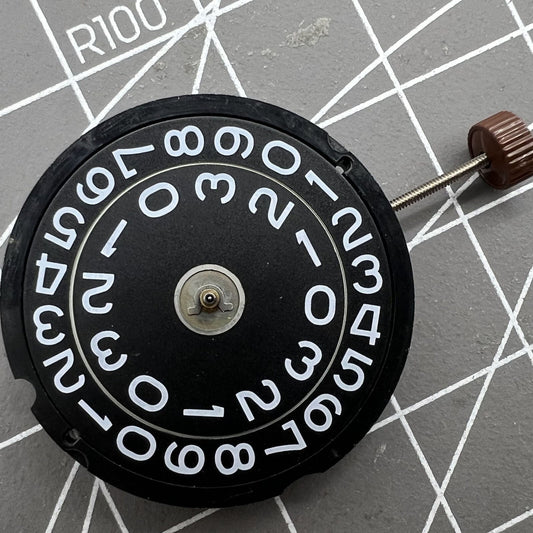 Swiss Made Ronda 519 black quartz watch movement for precise timekeeping and durability.