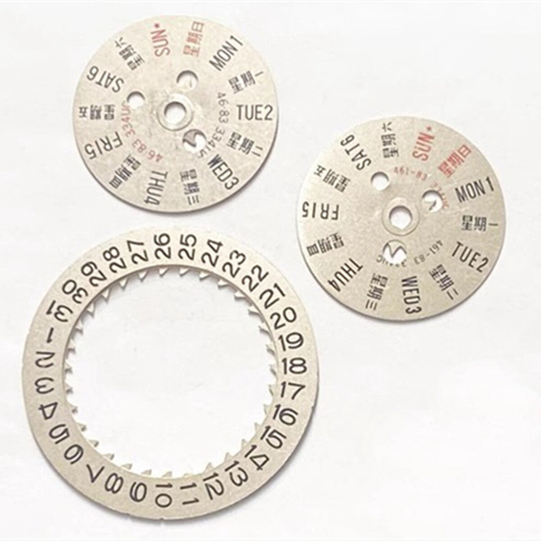 Silver date and week disk for Orient 46941/46943 watch movement, precise replacement part.
