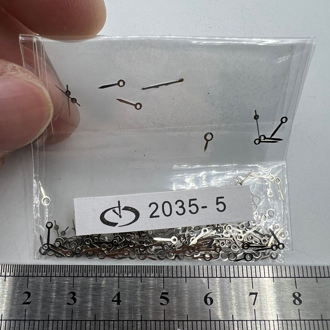 Silver 5mm second hands set for Miyota 2035 quartz watches, precise timing.