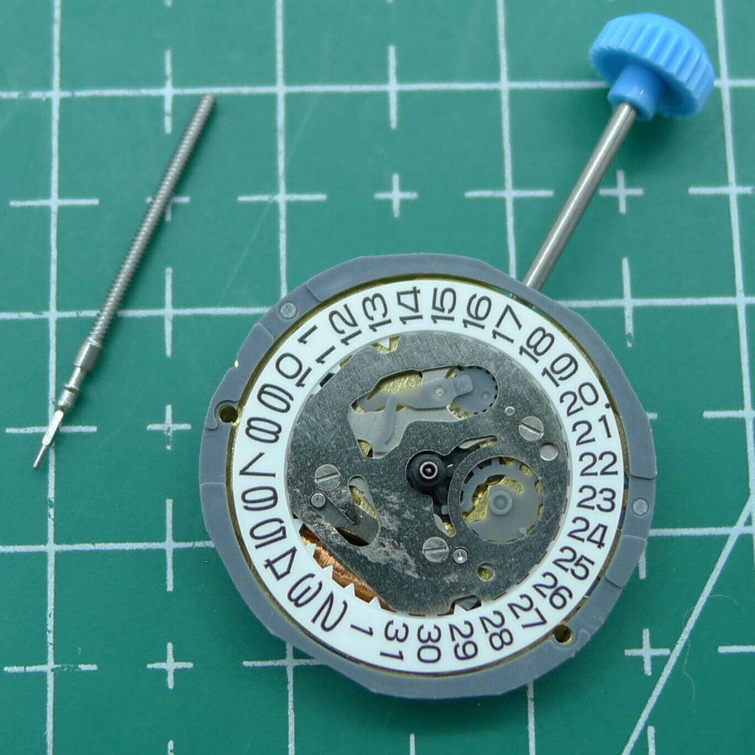 Miyota 6L12 quartz watch movement with date display at 3 o'clock, single calendar feature.