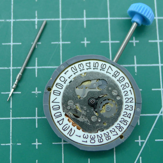 Miyota 6L12 quartz watch movement with date display at 3 o'clock, single calendar feature.