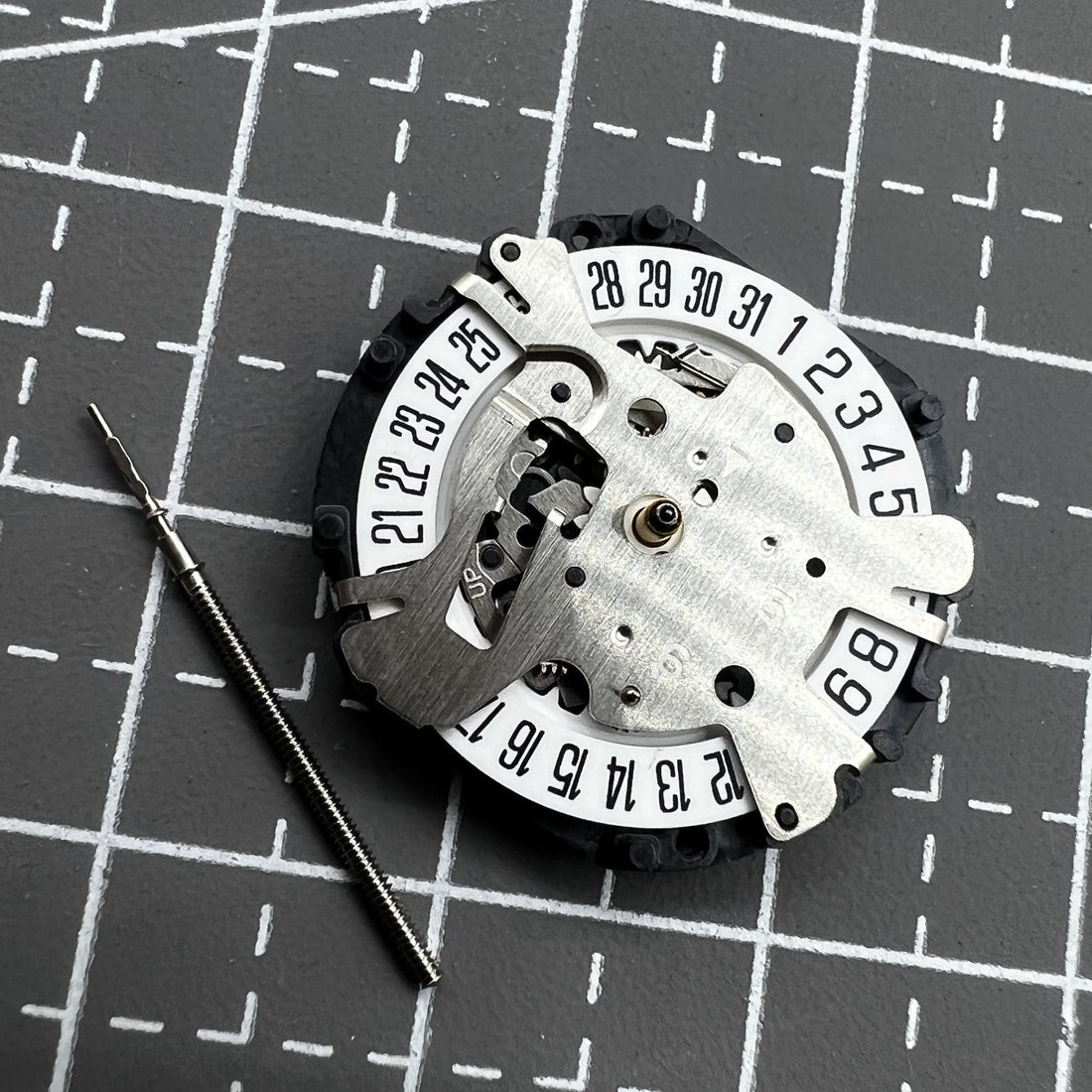 Hattori Epson VX16E quartz movement for precise watch accessory repair and replacement.