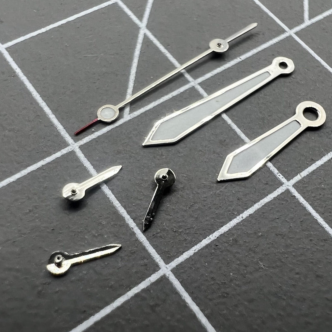 Arrow shape 13mm silver-trimmed green lume watch hands for VD53 VD54 VD57 movements.
