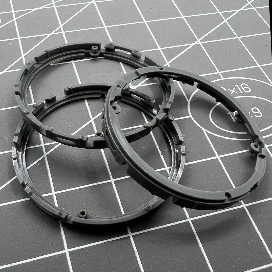 Set of 2 Seiko NH70 watch spacer rings with cushion mounts for secure movement fitting.