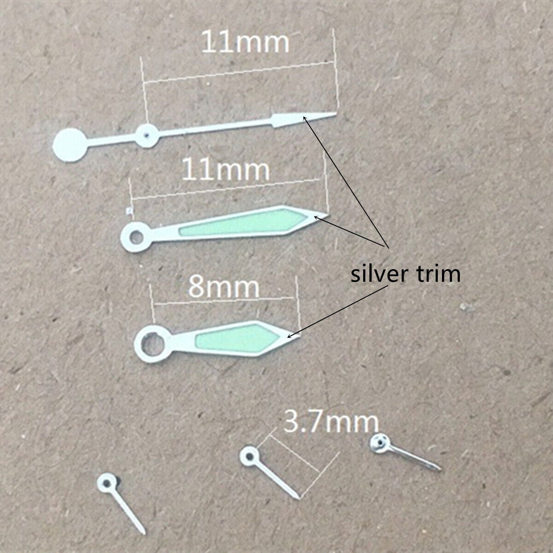 Silver arrow-shaped watch hands with green lume, compatible with Miyota OS10 OS20 OS60 OS80 movements.