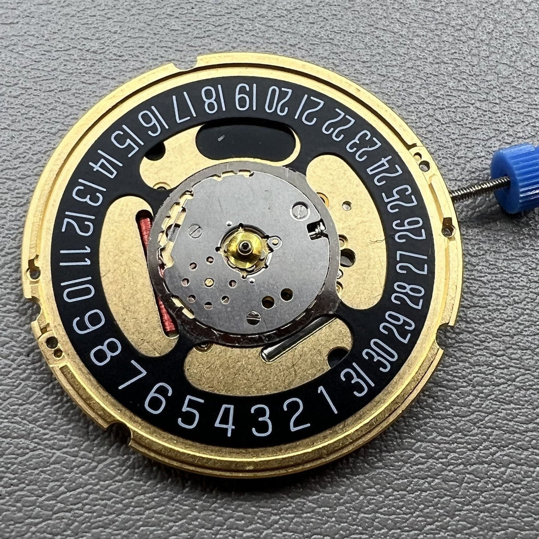 Swiss ETA F07.111 quartz movement watch with black dial, date at 6 o'clock by ETA brand