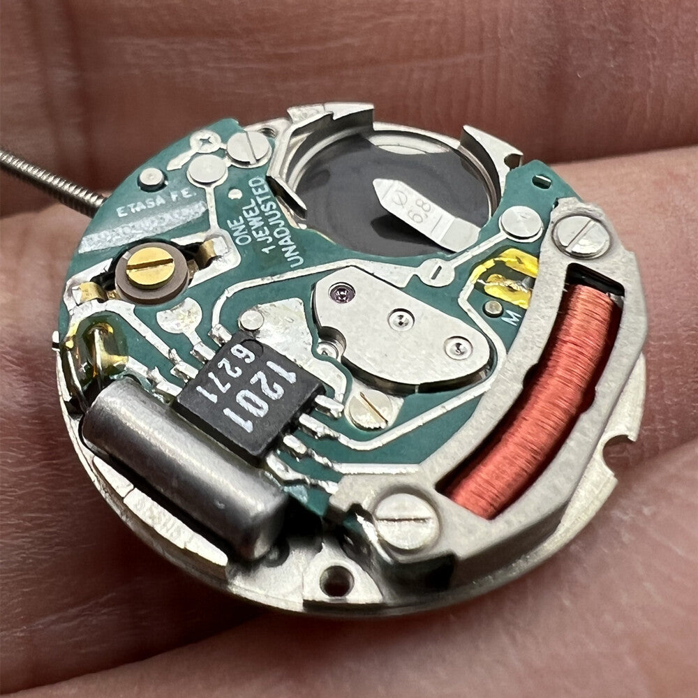 Swiss ETA556.115 quartz watch repair part with 3 hands and date window at 3 o'clock, branded ETA.