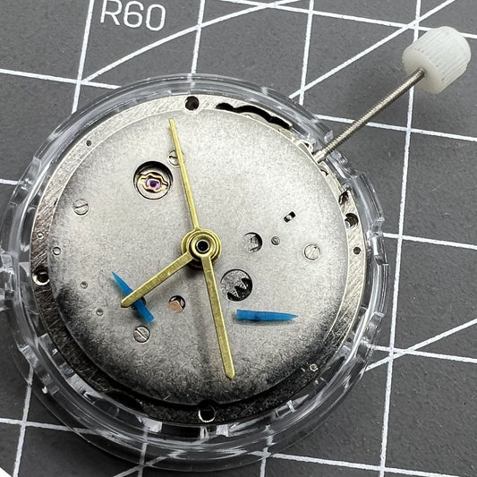 Shanghai Automatic Mechanical Movement R3-1 watch accessory showcasing precise mechanical parts and branded craftsmanship.