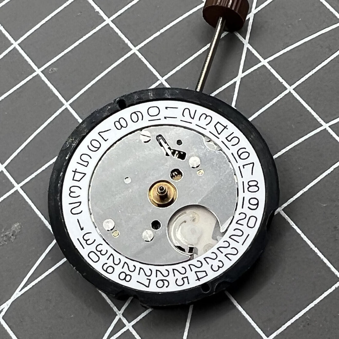 Swiss Ronda 505 quartz watch movement with date display at 3 o'clock, precise timekeeping by Ronda.
