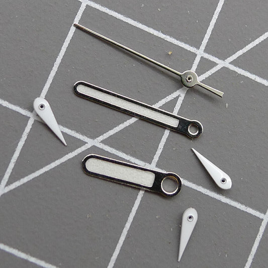 Silver pointed 10mm green luminous watch hands for Miyota 0S10 movement, perfect for repairs and upgrades.