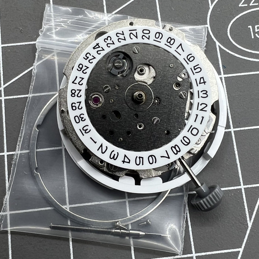 Miyota/Citizen 8215 silver plated automatic watch movement with date at 3 o'clock, Japan-made precision.