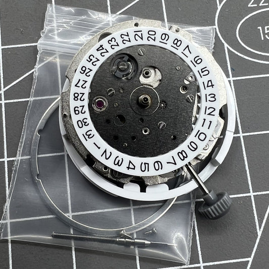 Miyota/Citizen 8215 silver plated automatic watch movement with date at 3 o'clock, Japan-made precision.