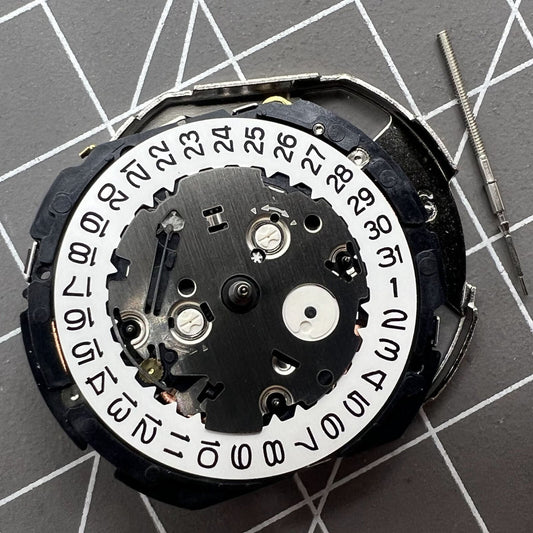 Hattori Epson TMI YM85A quartz watch movement, Japan-made precision for watch repair.