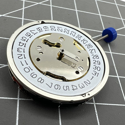 Swiss Ronda 5030D quartz watch movement with date display at 4 o'clock, precise timekeeping.