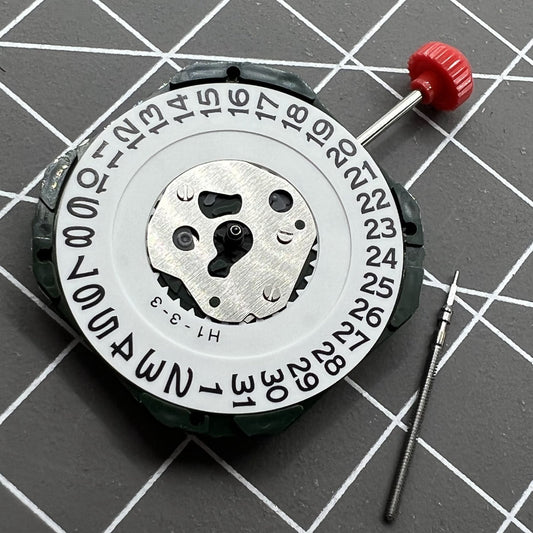 Miyota 2315 quartz watch movement with date at 3 and stem, precision Japan-made mechanism.