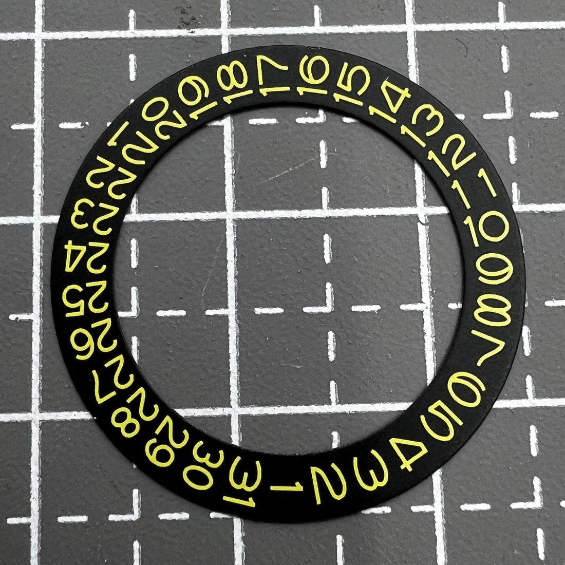 Yellow date wheel with black numbers for NH35 NH36 watch movement, enhancing dial readability.