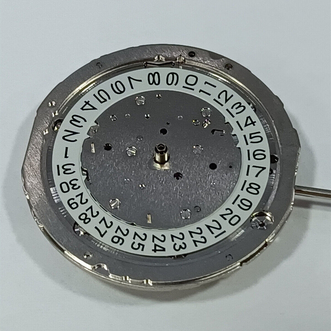 Miyota 9110 automatic mechanical watch part showcasing date feature at 3 o'clock, Japan made.