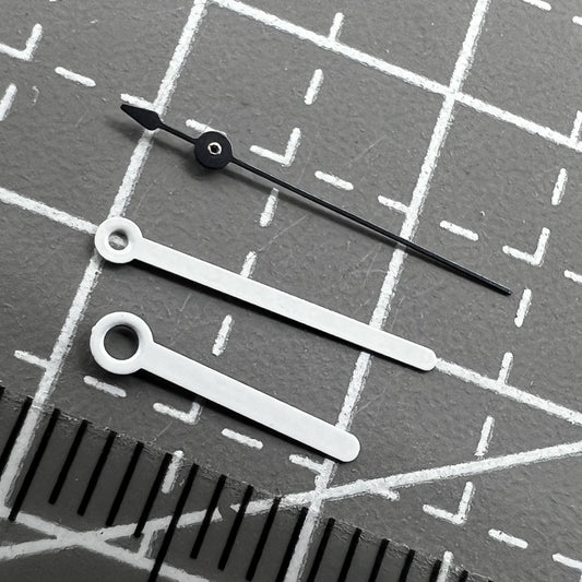 Set of 2 white 12mm pointed watch hands for Ronda 515 movement, perfect for precise repairs and upgrades.