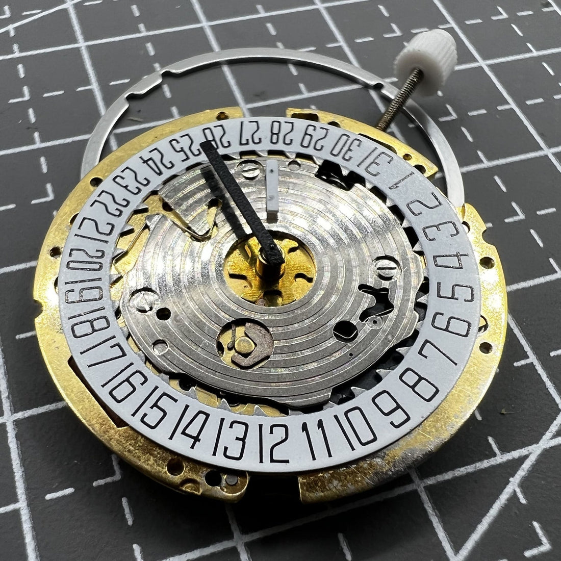 Swiss ISA 8176-2050 watch movement with quartz power, small second at 2 and date display at 6.