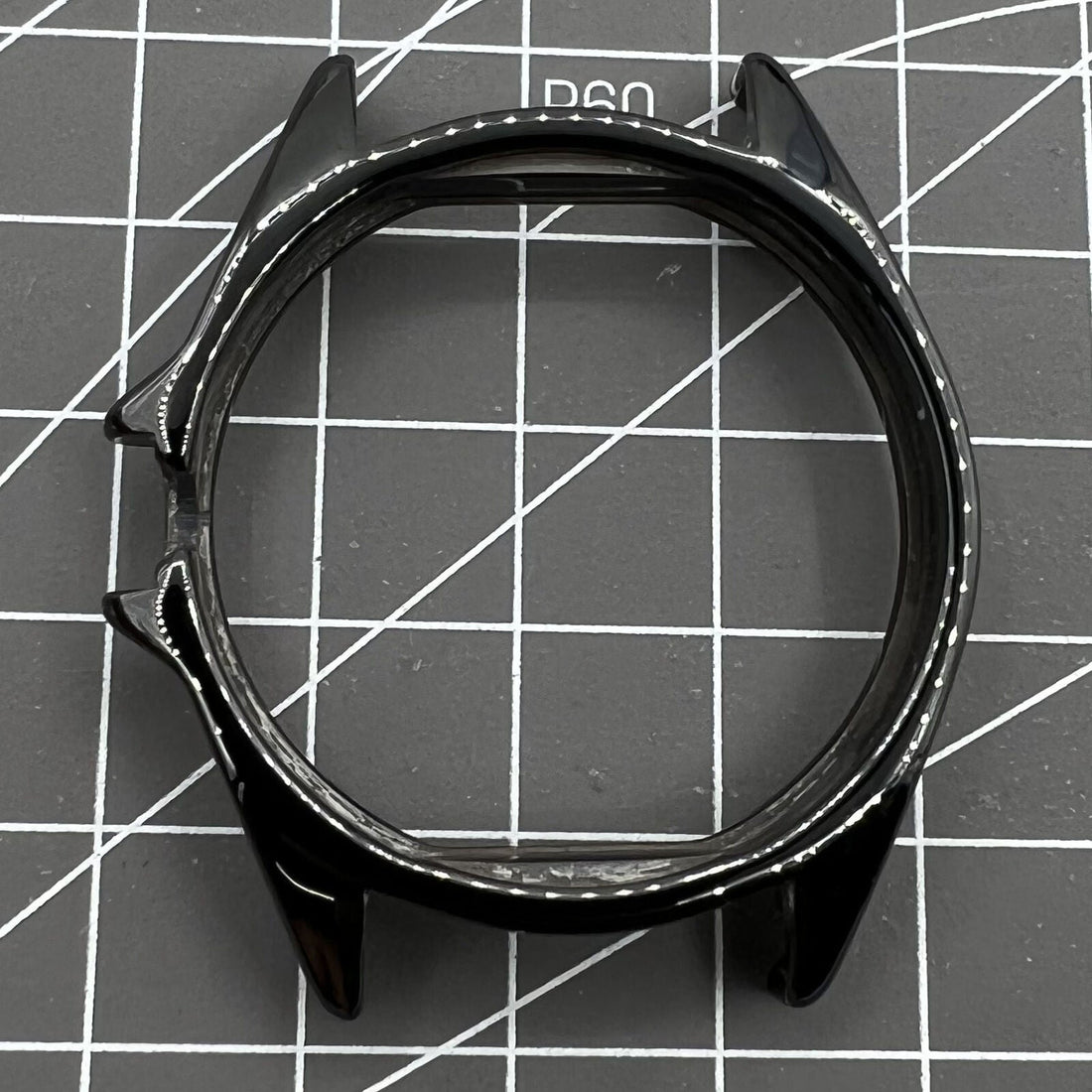 Black ceramic watch case replacement for men's J12 watch by Chanel, durable and stylish accessory.