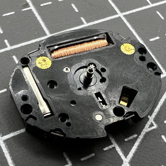 Hattori Epson VC11 quartz watch movement with stem for precise timekeeping and reliable performance.