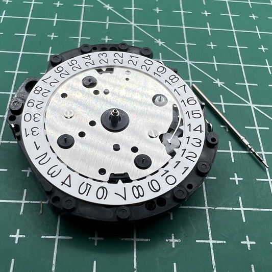 Hattori Epson VD53C quartz watch movement with date display at 3/6/4:30 for precise timekeeping