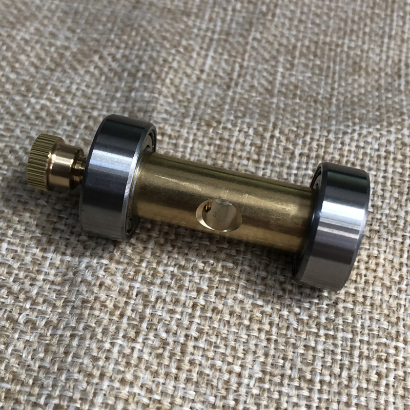 Copper watch repair screwdriver sharpener for precise jeweler and watchmaker tool maintenance.