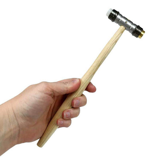 Bergeon 30417 watchmaker hammer with brass and synthetic ends for delicate watch repairs.