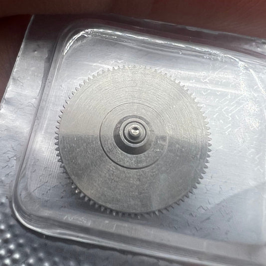 Complete barrel with new mainspring for YN55 YN56 watch movement, ensuring precise timekeeping.