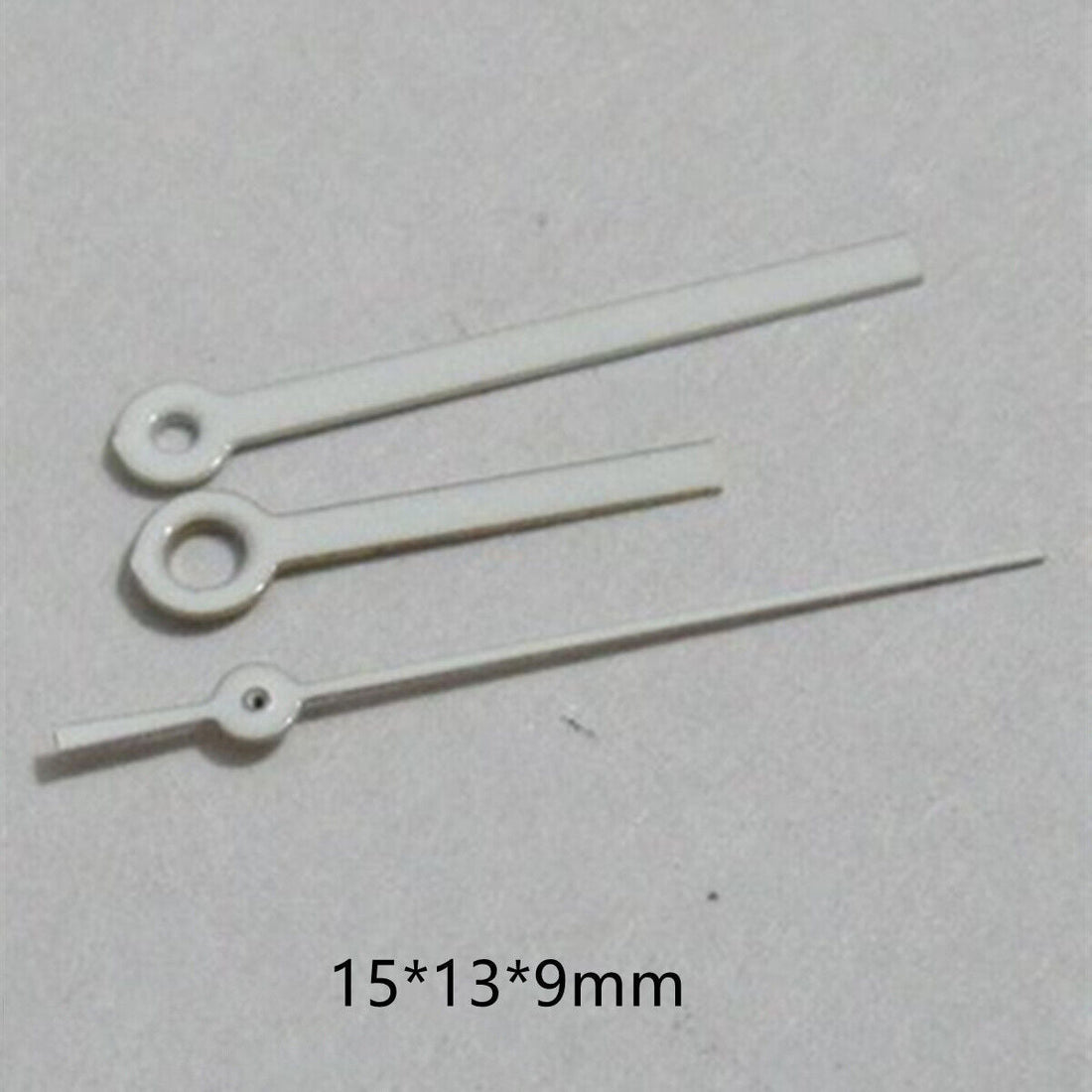 White watch hands set by Miyota, compatible with 2035, 2115, 2105, 2305, 2315 movements, 15x13x9mm.