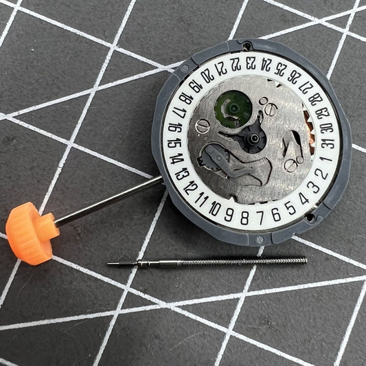 Miyota 1L12 quartz movement watch accessory with date display at 6 o'clock.