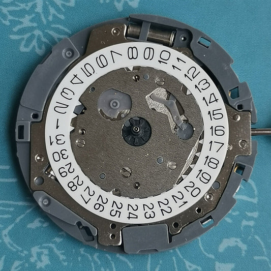 Japan Made Miyota OS11 quartz movement with white date wheel at 4 o'clock, watch part by Miyota.
