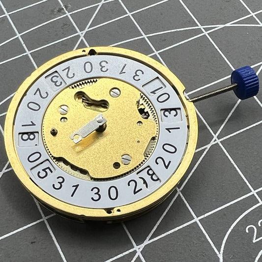 Ronda 4120B quartz watch movement with 2 hands and date display at 6 o'clock, 2-eye design