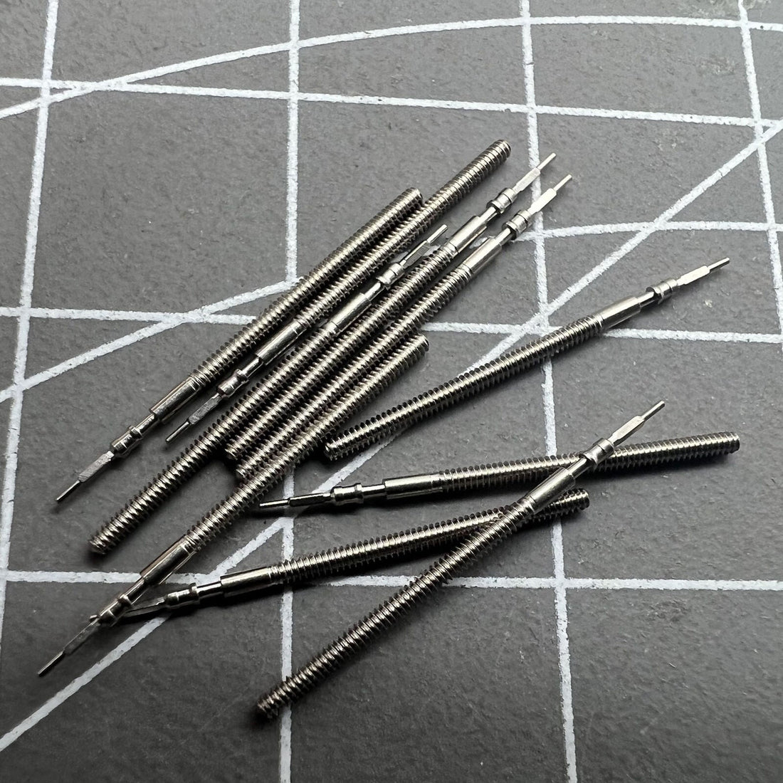 Precision watch winding stems compatible with Miyota 1N12 1M12 1L02 1M02 1L12 movements, ideal for watch repairs.