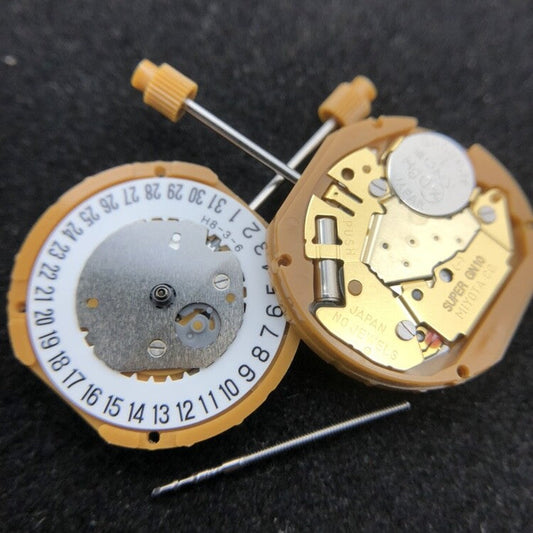 Miyota GN10 quartz watch movement showing date display at 3 and 6 o?clock positions