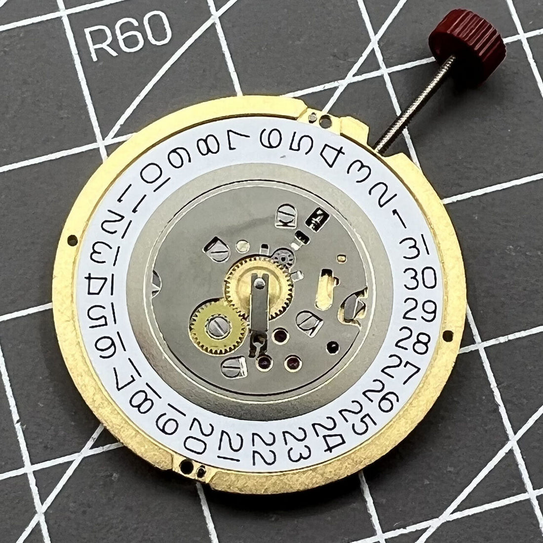Swiss Made Ronda 1019 quartz watch movement with date at 3, precise timekeeping for watch accessories.